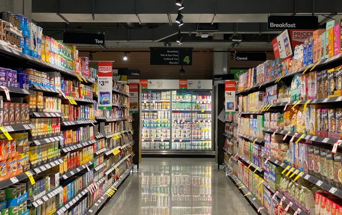 white and red labeled pack on white shelf