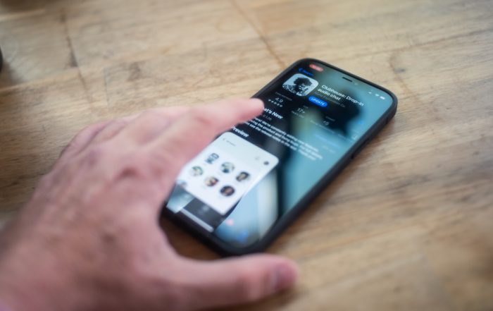 person holding black iphone 4