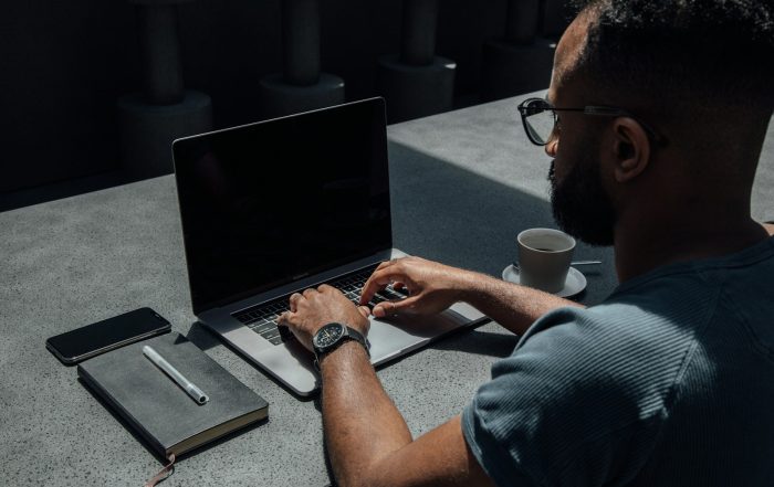 man using laptop computer